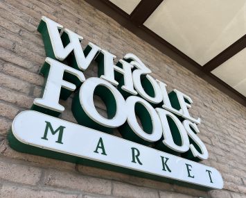 Close-up of the Whole Foods Market sign.