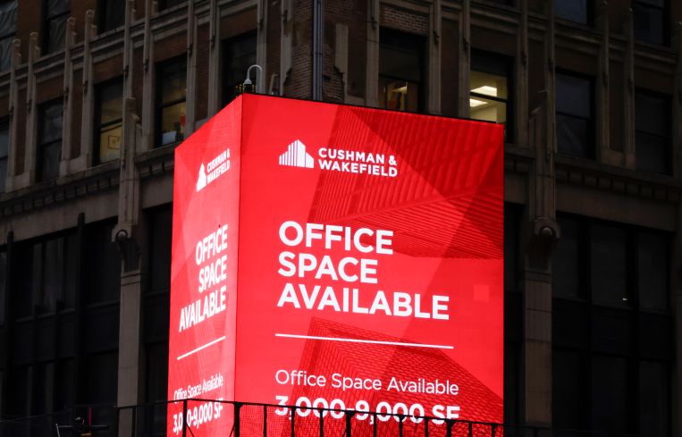 A sign advertises office space for lease in midtown Manhattan.