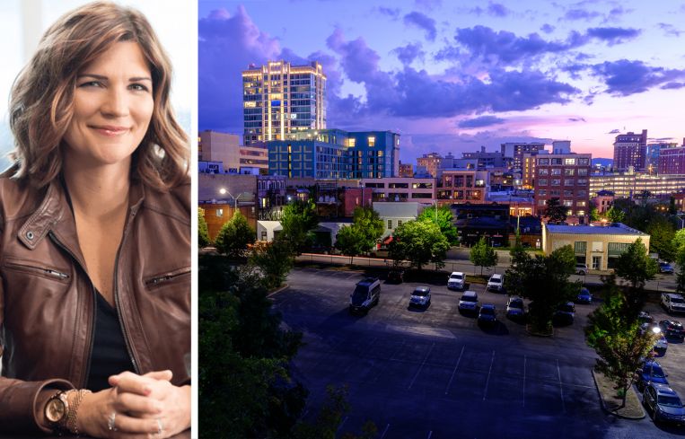 Anne Behrendt, CEO of Doran Companies, and the skyline of Asheville, N.C.