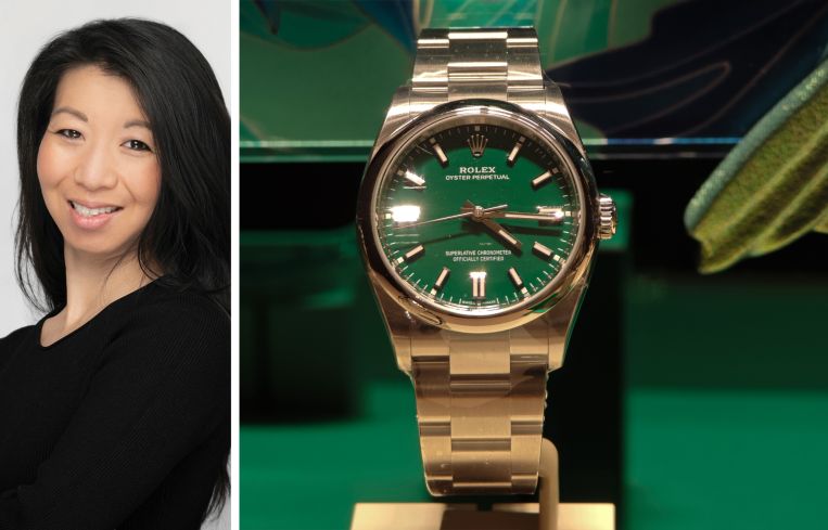 Empire State Realty Trust's Christina Chiu and a Rolex watch in a store display.