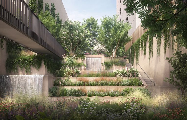 The landscaped garden features a multi-tiered waterfall.