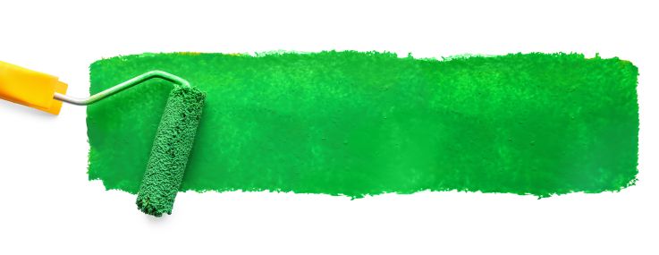 Roller with a green paint stroke on white background.