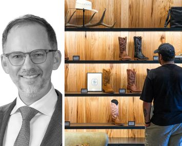 Newmark's Brandon Isner and a customer shopping for boots in a retail store.