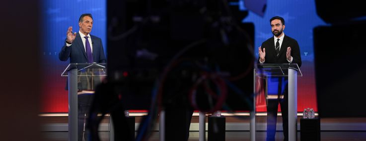 Mayoral candidates former New York Gov. Andrew Cuomo (left) and Zohran Mamdani speak during a mayoral debate.