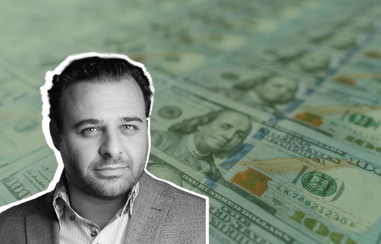 Louis Lebovits, CEO of BridgeCity Capital, overlayed on hundred dollar bills as a background.