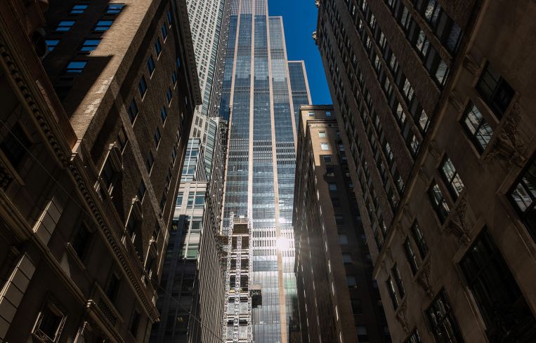 Office buildings tower over midtown Manhattan.