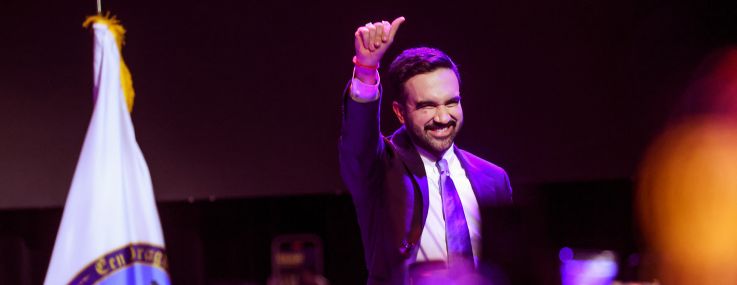 New York City Democratic mayoral candidate Zohran Mamdani celebrates as he takes the stage at his election night watch party.