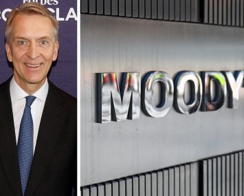 Brookfield's Bruce Flatt and Moody's logo outside 7 World Trade Center.