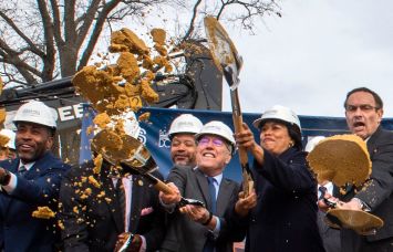 Mayor Muriel Bowser, center, ceremonially breaks ground with executes from Universal Health Services, George Washington University, Children's National Hospital, at the name reveal event of the New Hospital at St Elizabeths East Campus in Washington, D.C.