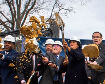 Mayor Muriel Bowser, center, ceremonially breaks ground with executes from Universal Health Services, George Washington University, Children's National Hospital, at the name reveal event of the New Hospital at St Elizabeths East Campus in Washington, D.C.