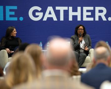 Angele Robinson-Gaylord (center) of Starbucks speaks on a panel at ICSC with Cassie Durand (left) of CBRE and Barrie Scardina (right) of Cushman & Wakefield on Dec. 10.