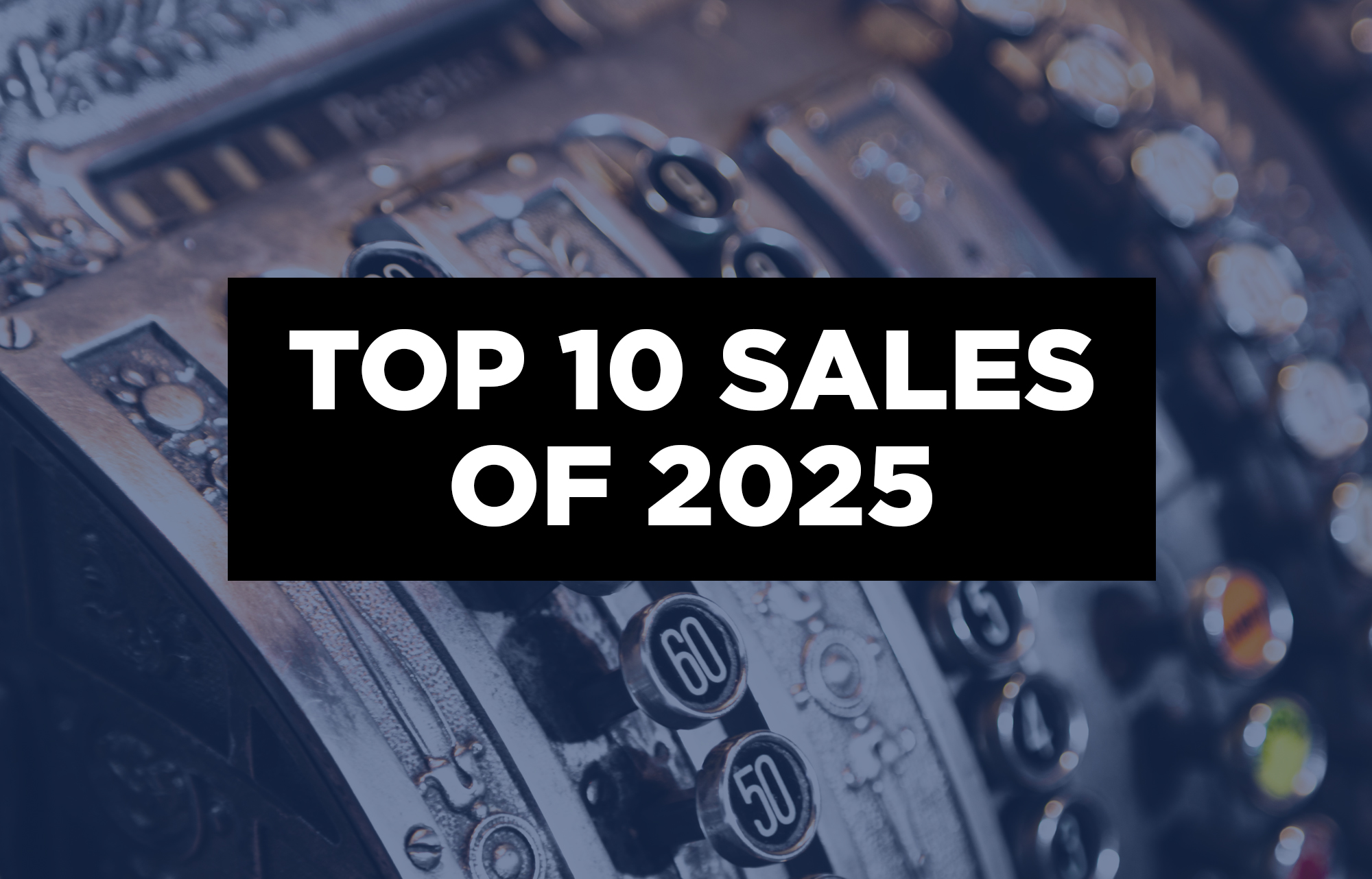 A photo of an old-time cash register with a placard that reads Top 10 Sales of 2025.