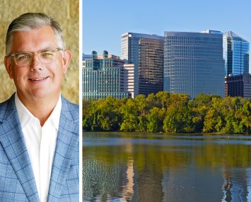 Deloitte U.S. CEO Jason Girzadas and they Rosslyn, Va. skyline.