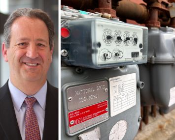 PSEG CEO Ralph LaRossa and a bank of National Grid electric meters.