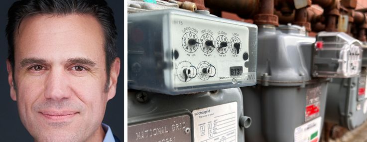 Scott Jennings of PSEG Long Island and a bank of National Grid electric meters.