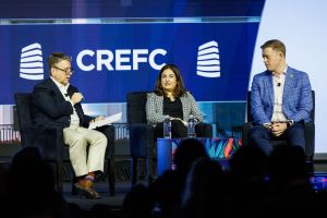 From left: Scott Sinder, Sairah Burki and David McCarthy speak at a panel at CREFC in Miami.