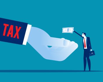 An illustration of a person in a business suit paying taxes.