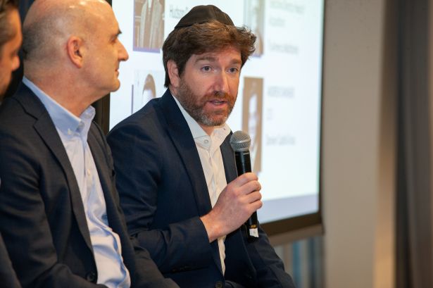 Yisroel Berg (right) speaks on a panel at Commercial Observer's Multifamily Investment Forum.