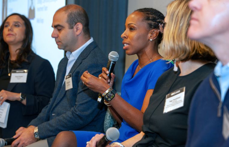 Margaret Anadu (center) speaks on a panel at Commercial Observer's Multifamily Investment Forum.