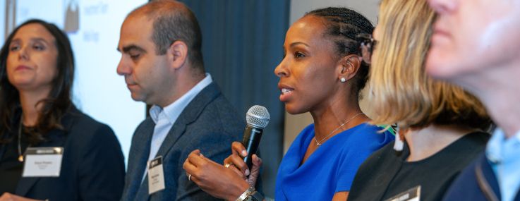 Margaret Anadu (center) speaks on a panel at Commercial Observer's Multifamily Investment Forum.