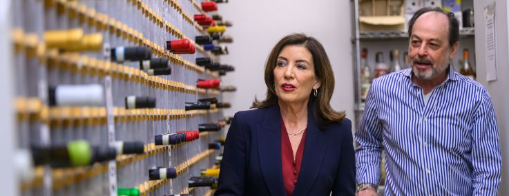Governor Kathy Hochul visits VOS Selections wine store to discuss the impact of tariffs.