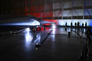 Visitors get a first look at NASA's and Lockheed Martin's X-59 experimental supersonic jet during a roll-out ceremony in Palmdale, California. 