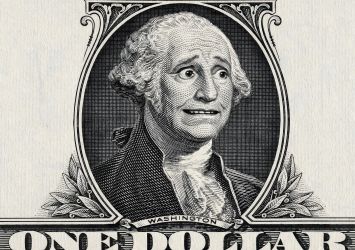 A portrait on a dollar bill of a worried George Washington.
