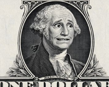 A portrait on a dollar bill of a worried George Washington.