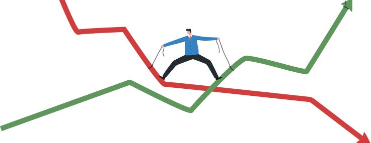 An illustration of a business person wrestling with interest rates.