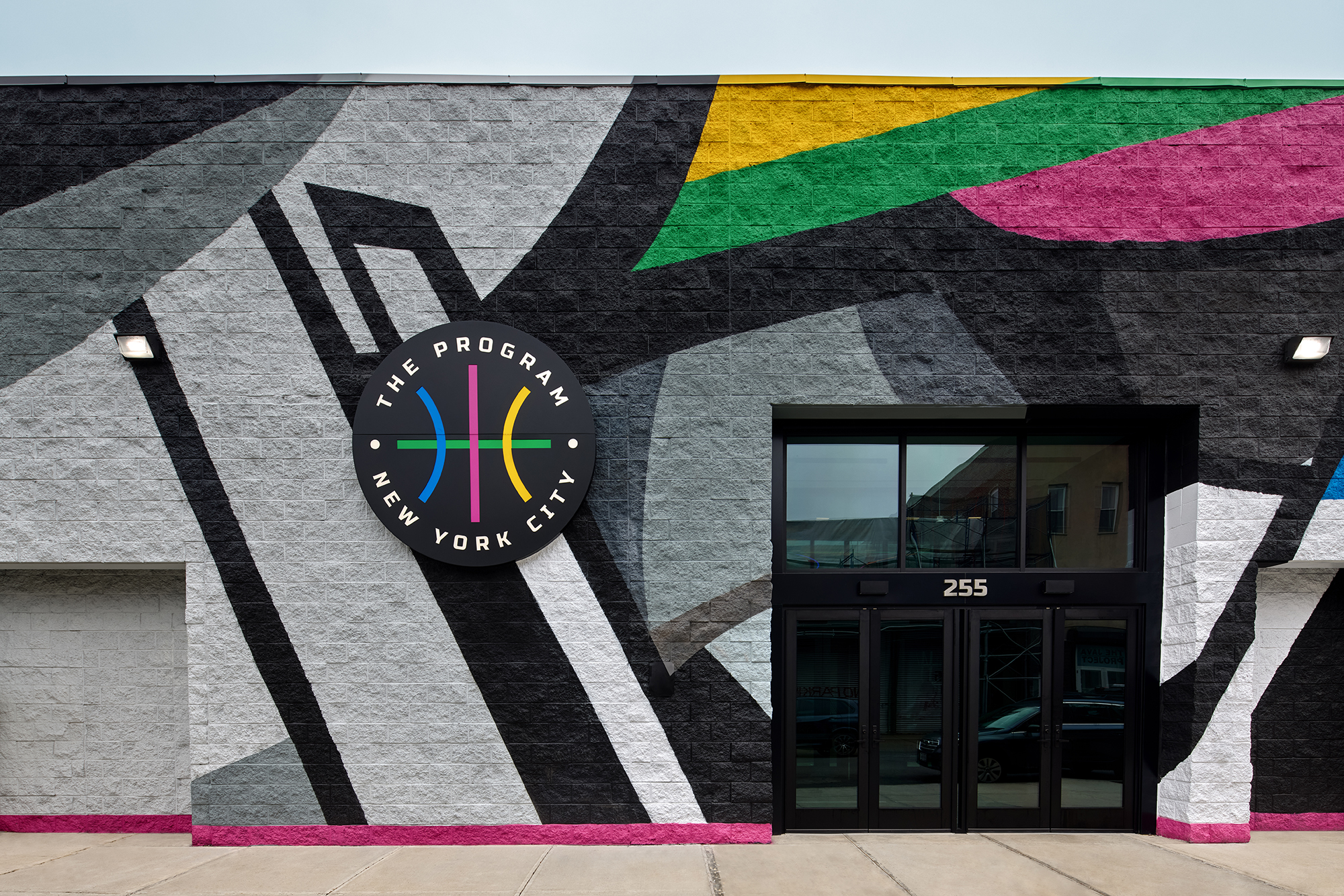 The exterior of the building is adorned with a mural designed by local street artist Sandro “Sen2” Figueroa.