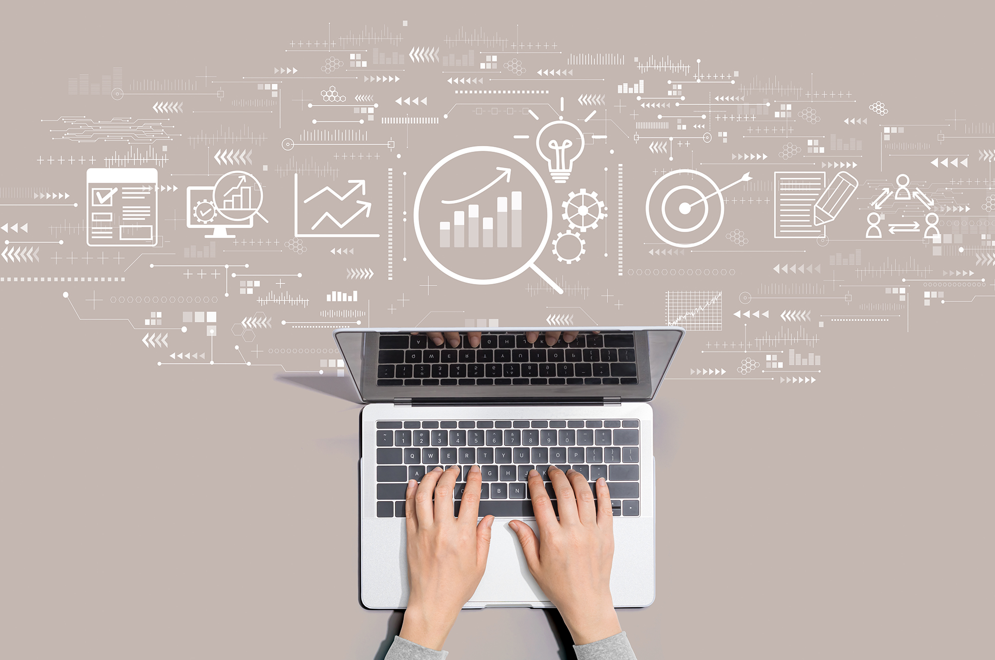 An illustration of a person using a laptop computer to do data analysis.
