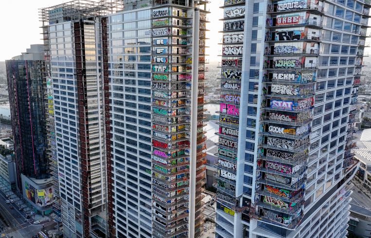 An aerial view of colorful graffiti spray-painted the abandoned real estate project in Downtown Los Angeles, California.