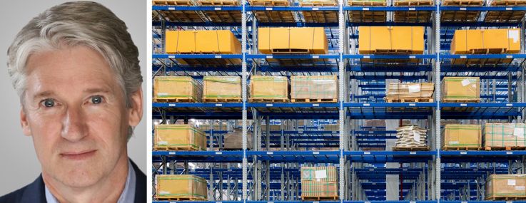 MDH Partners co-founder Jeffrey Small Jr. and shelves inside of a warehouse.