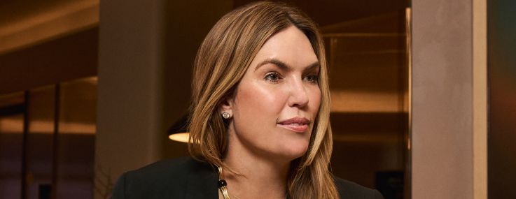 Newmark's Liz Hart in a conference center/amenity space at 1251 Avenue of the Americas where Newmark leads leasing.