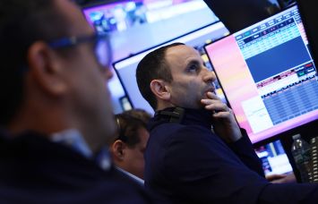 Traders work on the floor of the New York Stock Exchange (NYSE) on March 2.