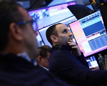 Traders work on the floor of the New York Stock Exchange (NYSE) on March 2.
