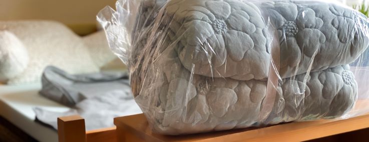 A dorm room with some supplies.