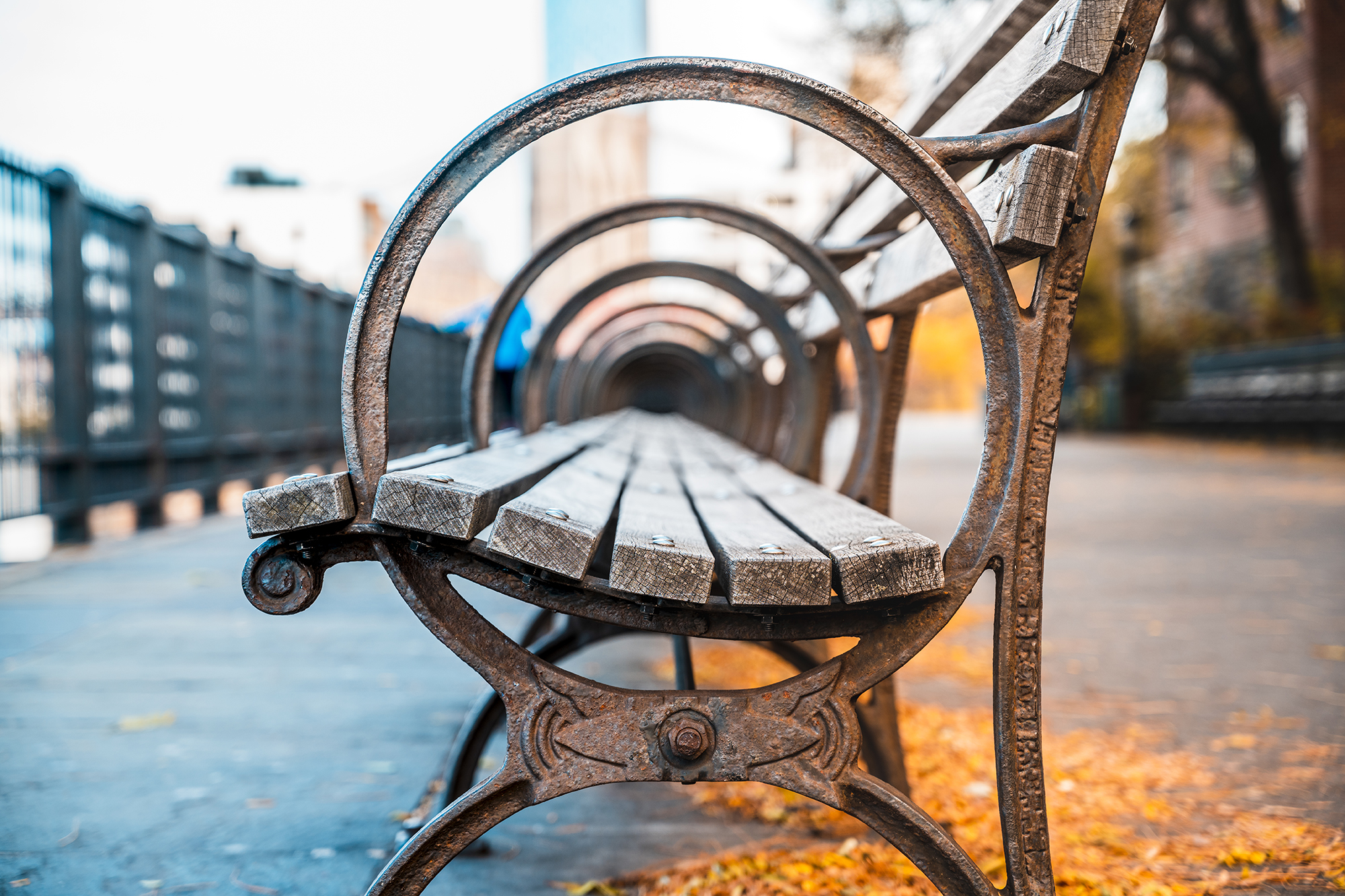 A park bench on a promenade.