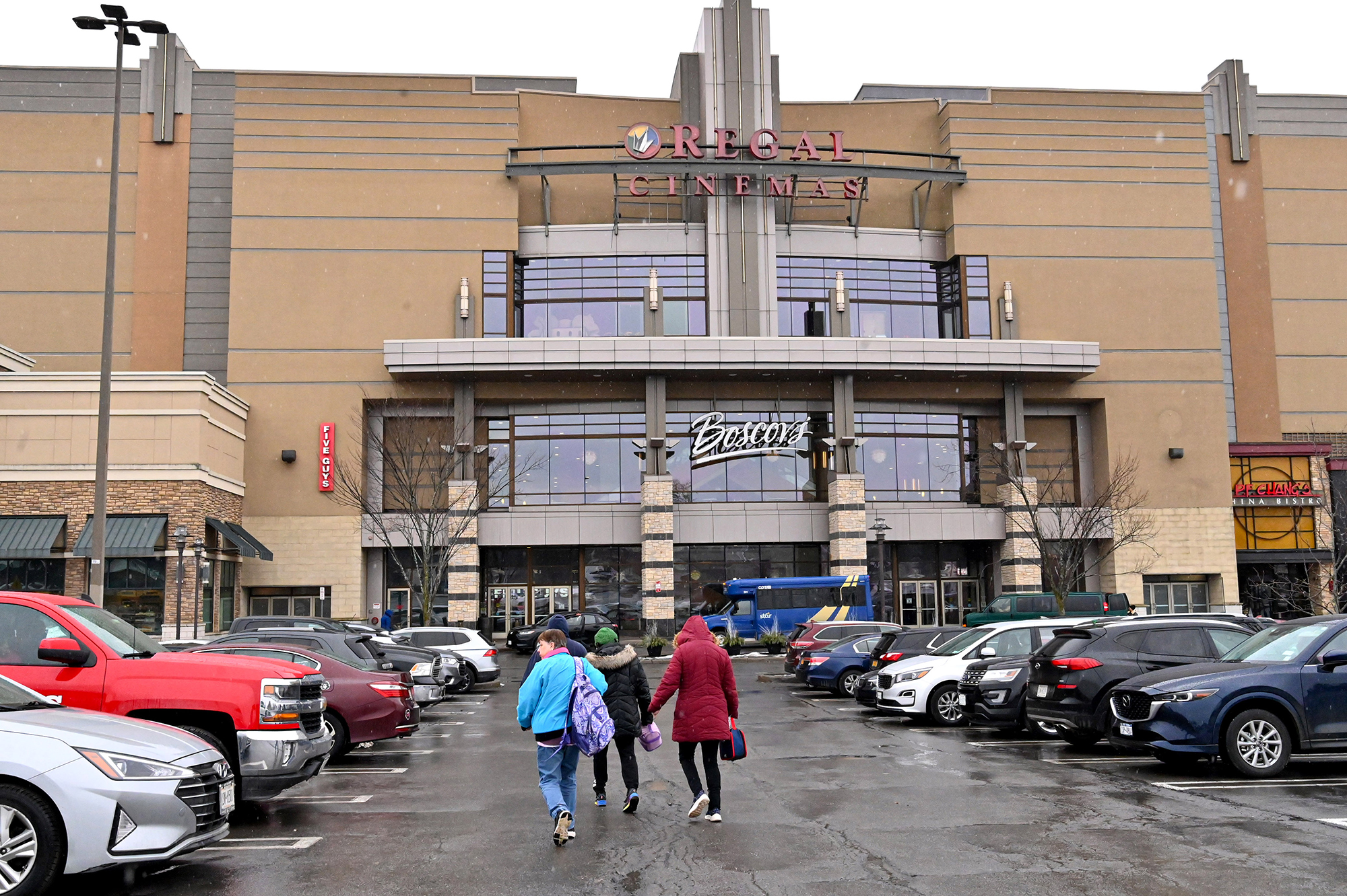 Shoppers walk to Colonie Center in Colonie, N.Y.