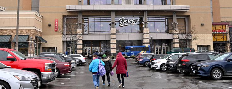 Shoppers walk to Colonie Center in Colonie, N.Y.