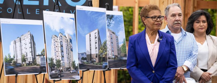 Mayor Karen Bass, Veteran David Sinatra and Lourdes Castro Ramirez, president and CEO of Housing Authority of the City of Los Angeles, during a press conference on affordable housing at a construction project for affordable veteran housing on Barrington Avenue in West Los Angeles.