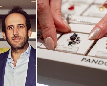 Rudin's Michael Rudin and a display of Pandora jewelry.