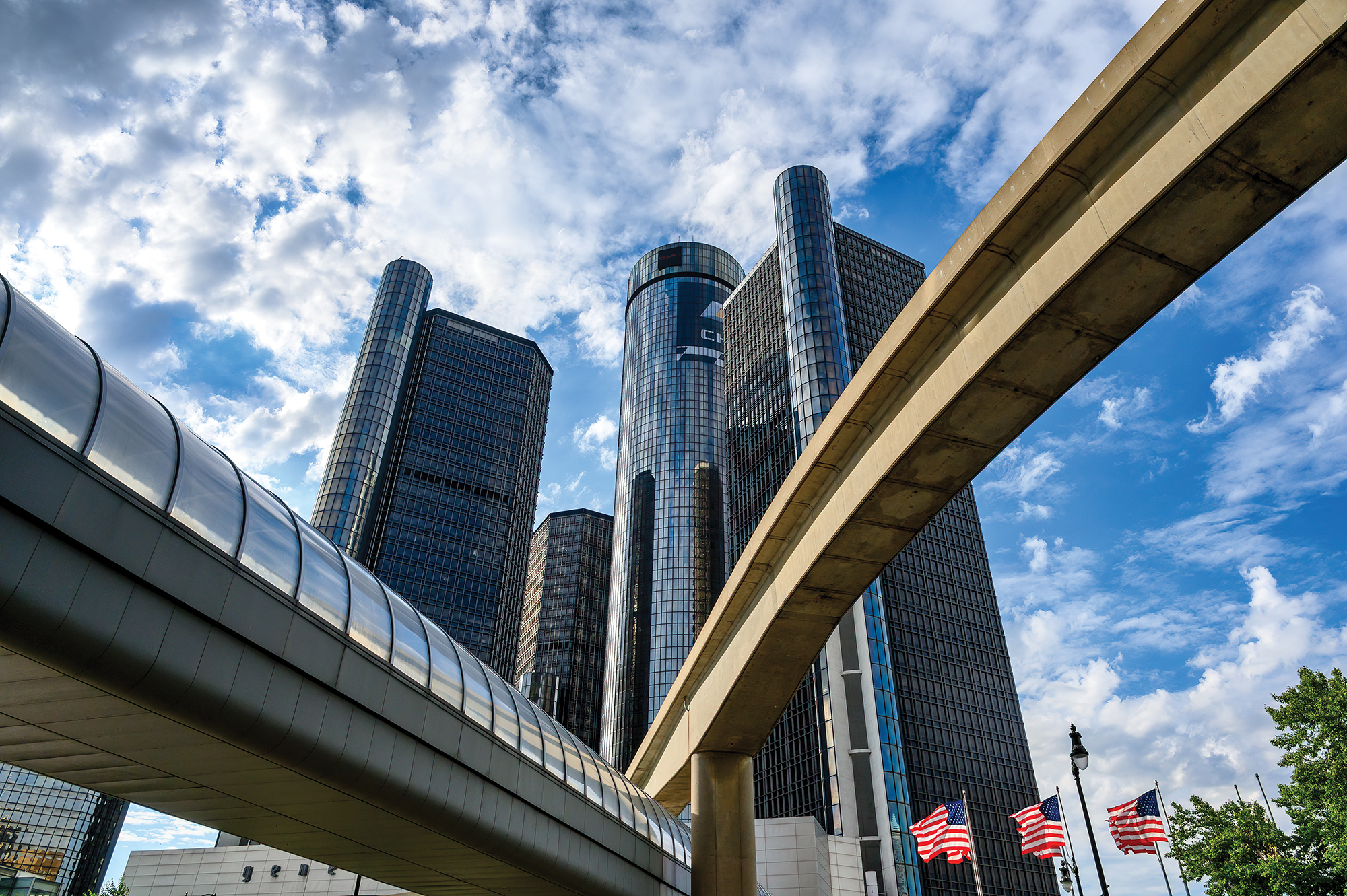 How Commercial Real Estate Investment Fueled Detroits Urban Comeback The Renaissance Center framed by a footbridge and the monorail infrastructure in Detroit.