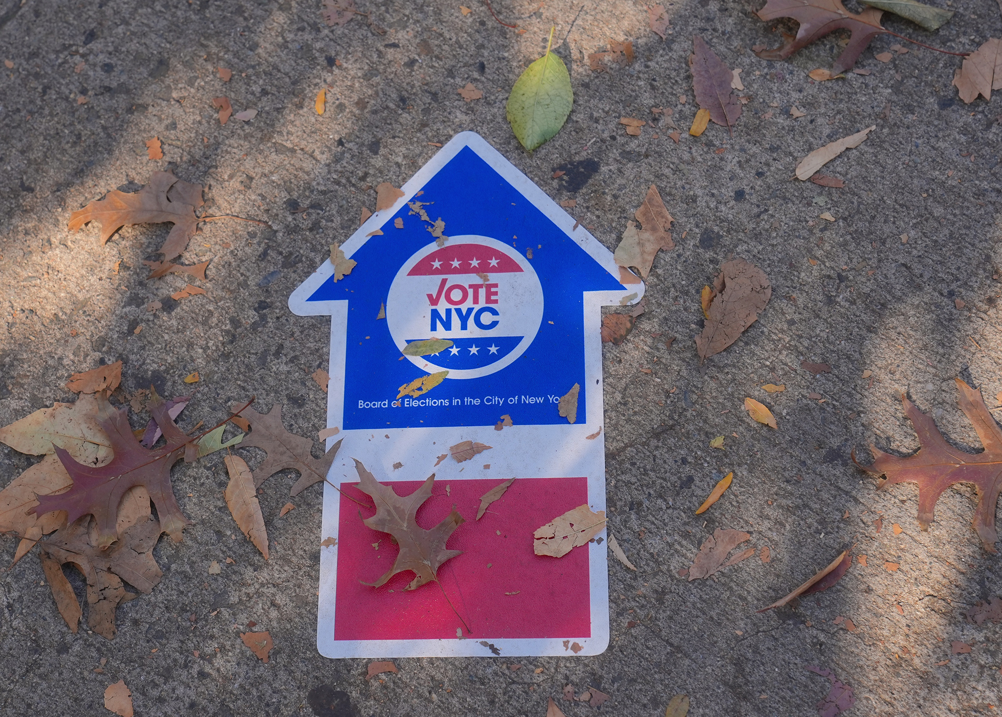 A sign indicating the direction to the polling station in Queens, New York.