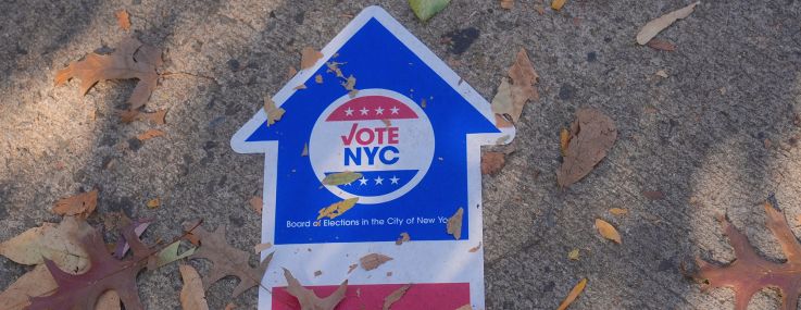 A sign indicating the direction to the polling station in Queens, New York.