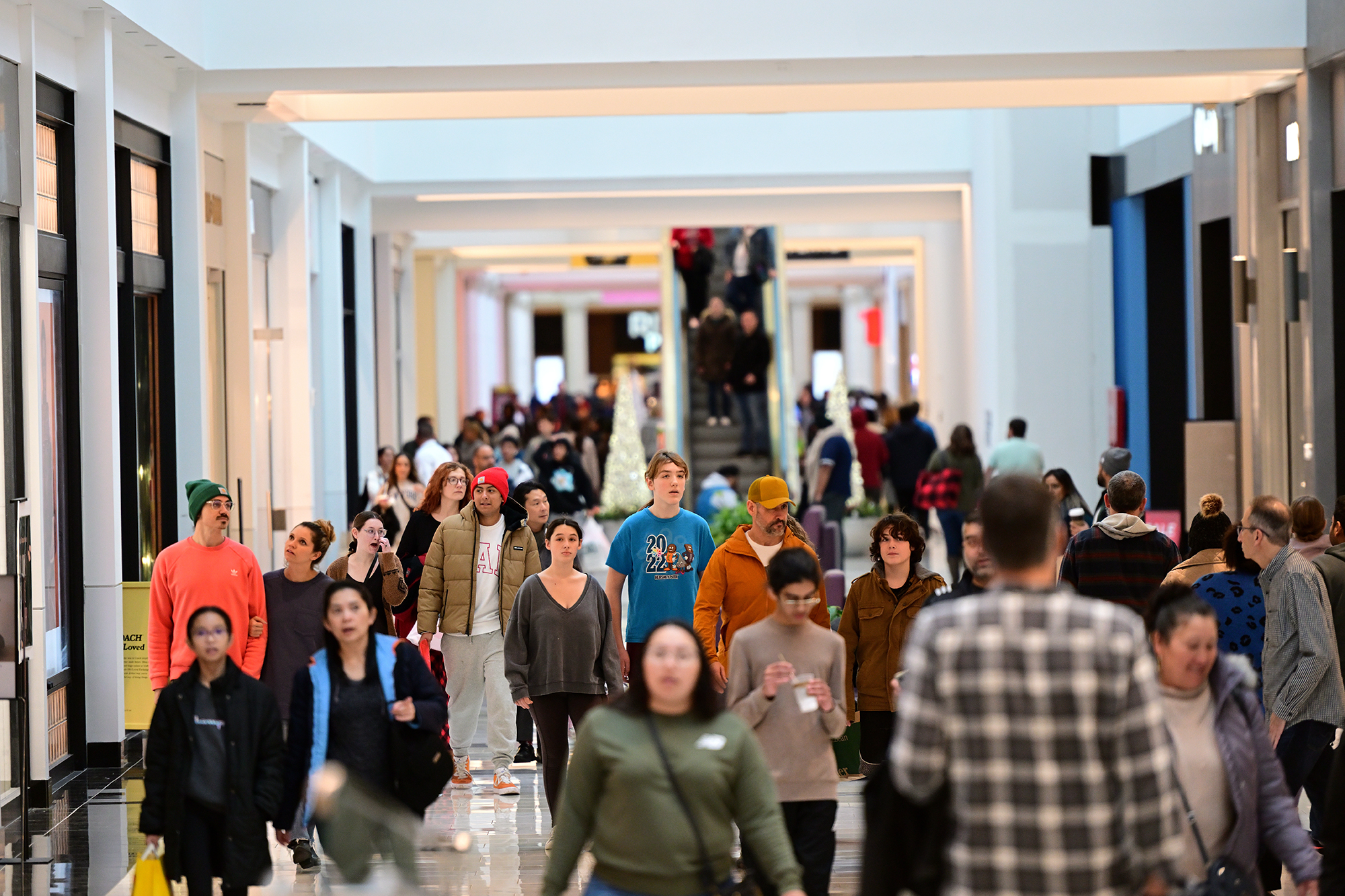 Shoppers walk through the King of Prussia Mall in King of Prussia, Pa.