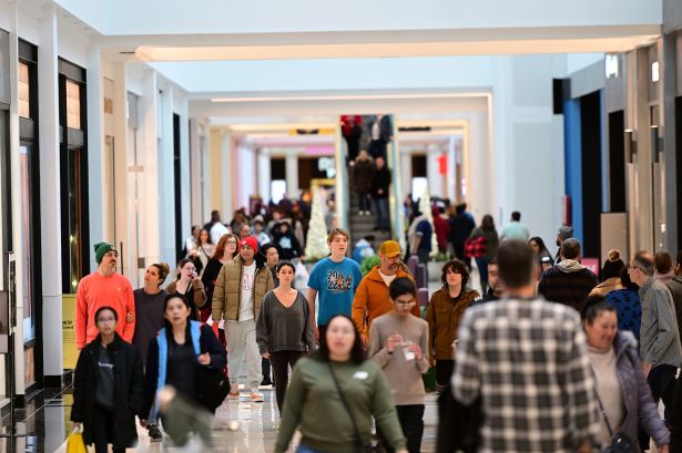 Shoppers walk through the King of Prussia Mall in King of Prussia, Pa.