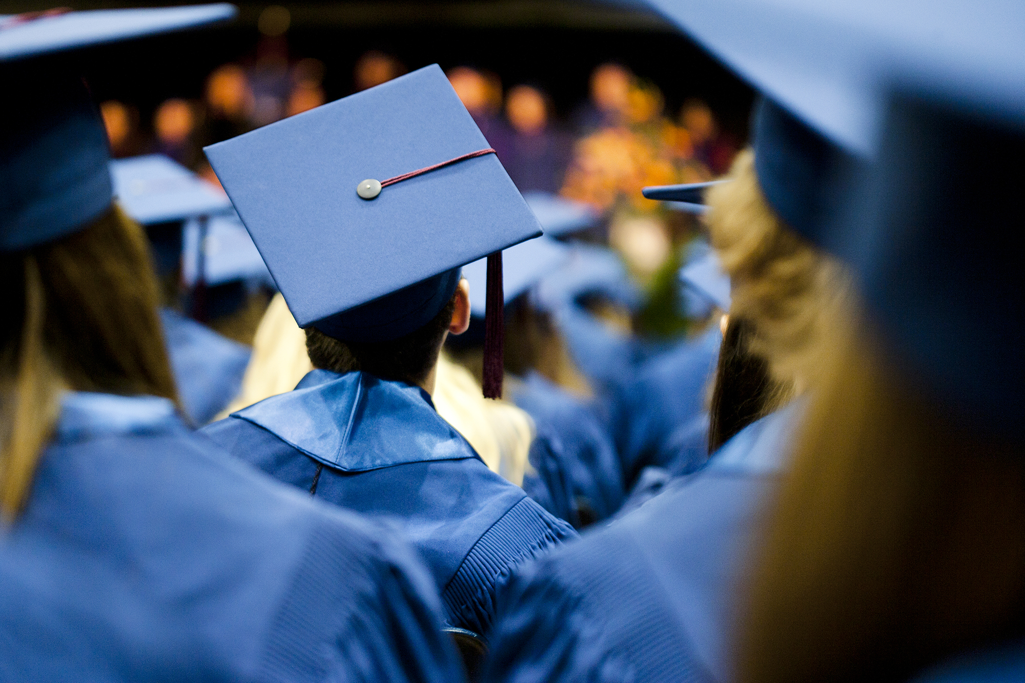 Students at a graduation ceremony.