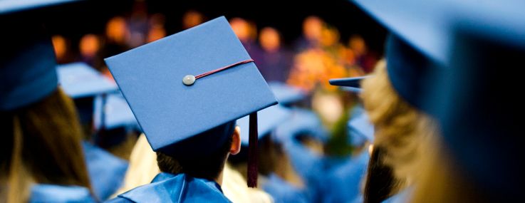 Students at a graduation ceremony.
