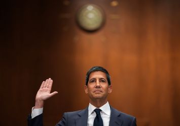 Kevin Warsh is sworn in to testify during his Senate Committee on Banking, Housing, and Urban Affairs confirmation hearing.